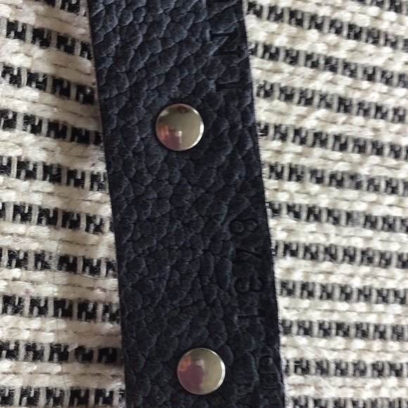 Orciani genuine leather with silver buckle.